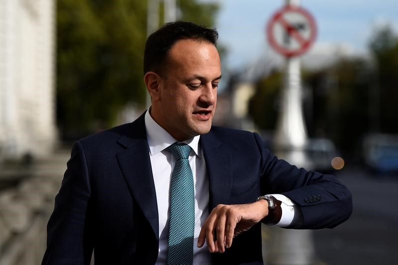 © Reuters. FILE PHOTO: Ireland's Taoiseach Leo Varadkar walks outside Government Buildings in Dublin, Ireland