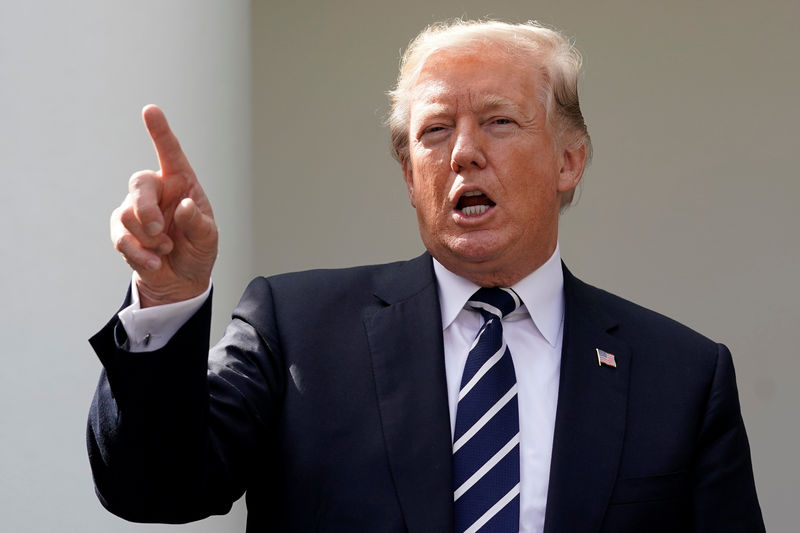 © Reuters. U.S. President Donald Trump gestures at a news conference in the Rose Garden of the White House in Washington