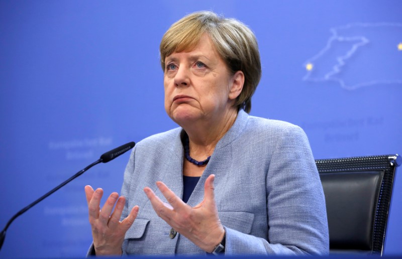 © Reuters. German Chancellor Angela Merkel speaks during a news conference during a European Union leaders summit meeting in Brussels