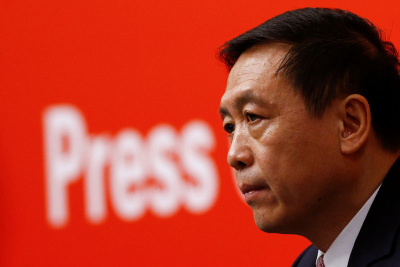 © Reuters. Vice Minister of the State Administration of Press, Publication, Radio, Film and Television Zhang Hongsen attends a news conference during the 19th National Congress of the Communist Party of China in Beijing