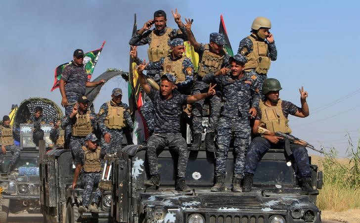 © Reuters. Иракские солдаты в окрестностях Киркука