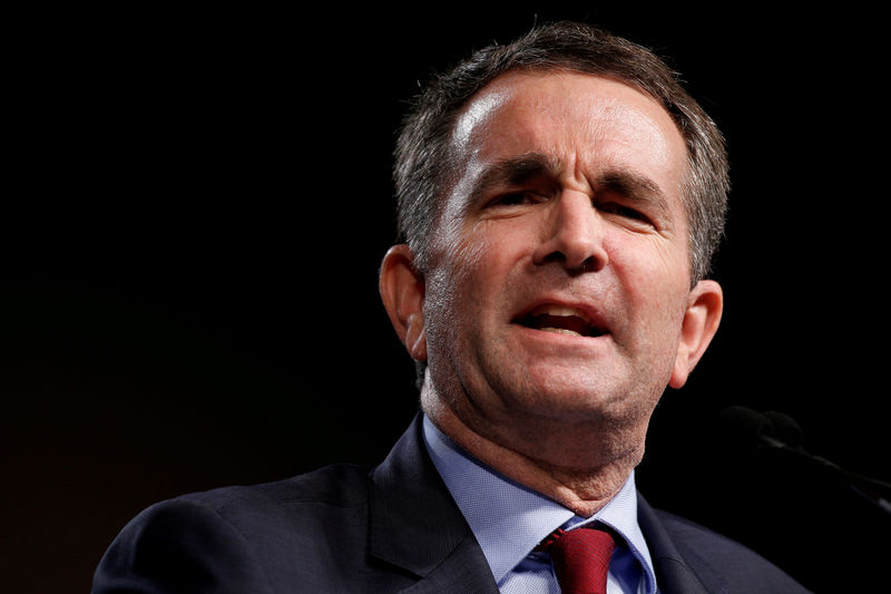 © Reuters. FILE PHOTO: Virginia Lieutenant Governor Ralph Northam, Democratic candidate for governor, delivers remarks before introducing former U.S. President Barack Obama to speak at a rally with supporters in Richmond