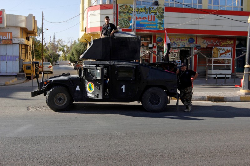 © Reuters. A vehicle of the Iraqi Federal police is seen on a street in Kirkuk