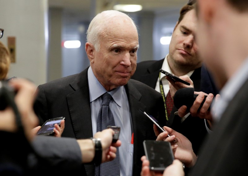 © Reuters. Senator John McCain (R-AZ) speaks to reporters as he arrives for a vote on Capitol Hill in Washington