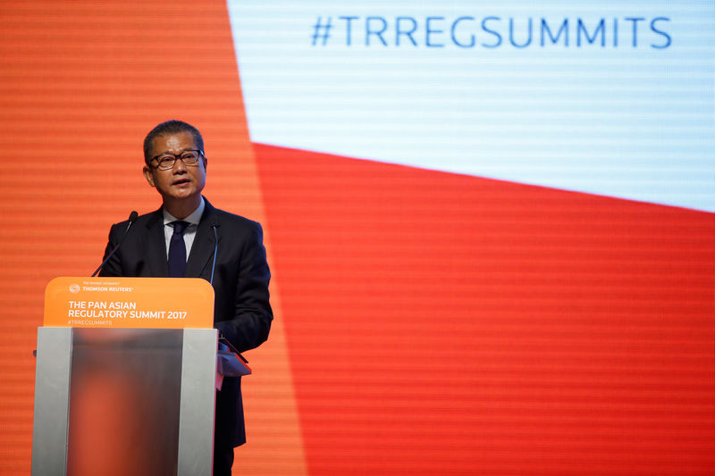 © Reuters. Hong Kong Financial Secretary Paul Chan addresses Pan Asian Regulatory Summit in Hong Kong
