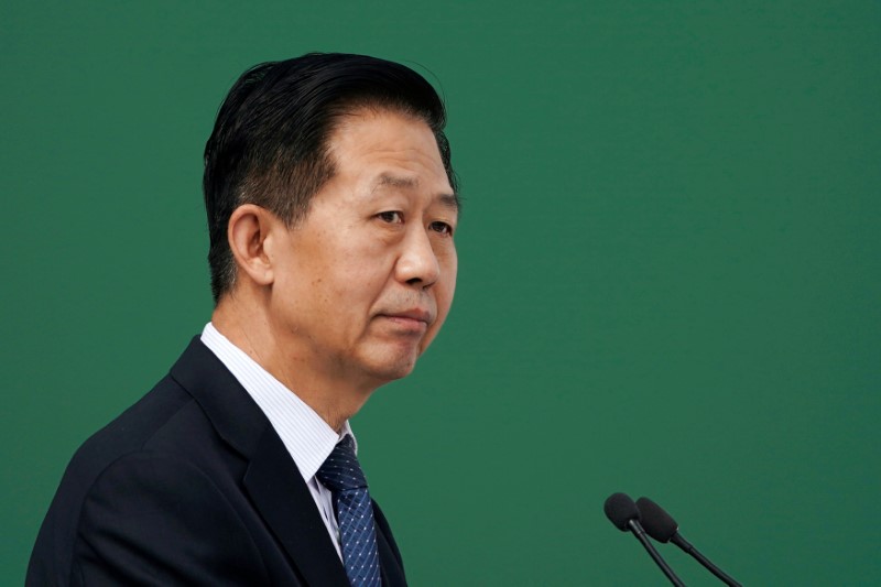 © Reuters. Chinese Finance Minister Xiao Jie attends a groundbreaking ceremony at New Development Bank permanent headquarters building in Shanghai