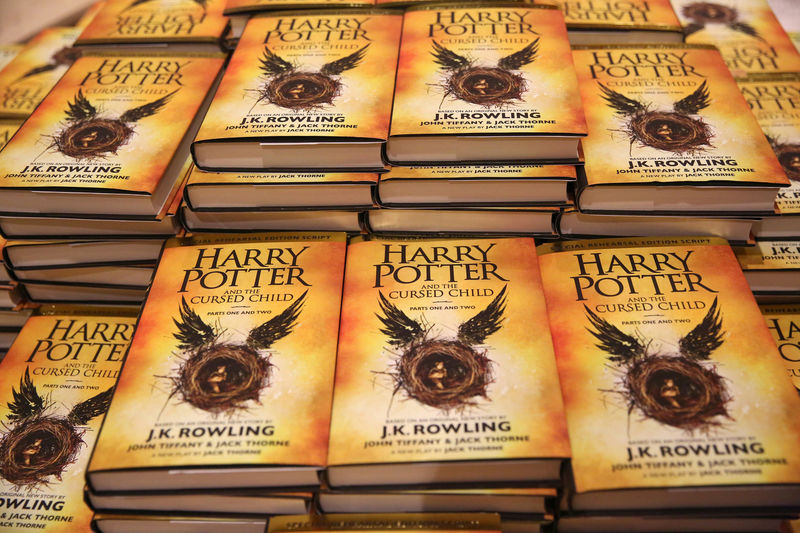 © Reuters. FILE PHOTO: Copies of the book of the play of Harry Potter and the Cursed Child parts One and Two are displayed at a bookstore in London