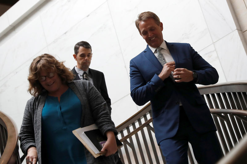 © Reuters. Sen. Jeff Flake (R-AZ) arrives for Senate Foreign Relations Committee briefing on Capitol Hill in Washington