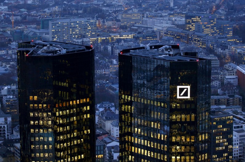 © Reuters. FILE PHOTO: The headquarters of Germany's Deutsche Bank is seen early evening in Frankfurt