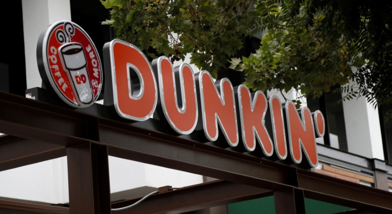 © Reuters. FILE PHOTO: The sign of a Dunkin' store, the first since a rebranding by the Dunkin' Donuts chain, is pictured ahead of its opening in Pasadena