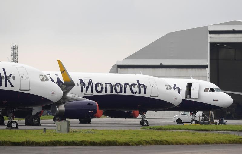 © Reuters. Monarch airplanes are seen parked on the runway after the airline went into administration at Newquay airport, Newquay