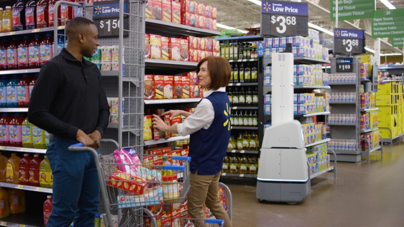 © Reuters. Wal-Mart Stores Inc's shelf-scanning robots replenish inventory to save employees time when products run out as seen in this handout photo