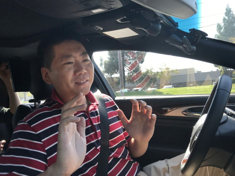 © Reuters. Nullmax CEO Lei Xu drives a Lincoln MKZ sedan equipped with a self-driving hardware and software in Fremont