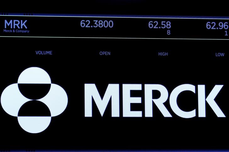 © Reuters. A screen displays the logo and trading information for Merck, pharmaceutical company on the floor of the NYSE in New York