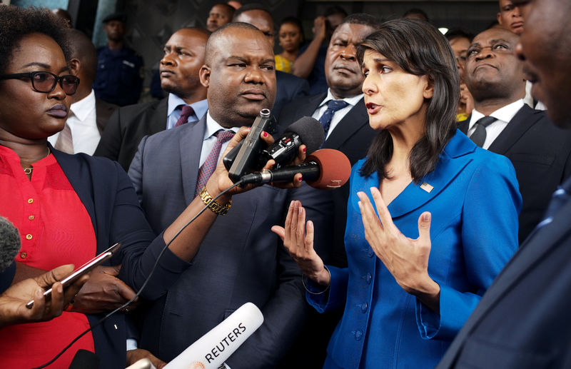 © Reuters. U.S. Ambassador to the United Nations Nikki Haley and President of Congo's electoral commission Corneille Nangaa addresses the media at the CENI headquarters in Gombe, Kinshasa