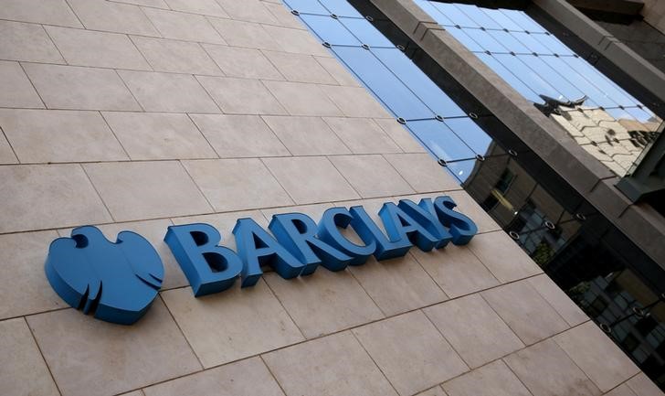 © Reuters. FILE PHOTO - A Barclays logo is pictured outside the Barclays towers in Johannesburg