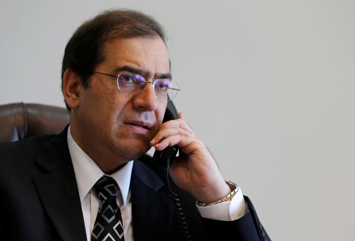 © Reuters. Molla is pictured at his office in Cairo