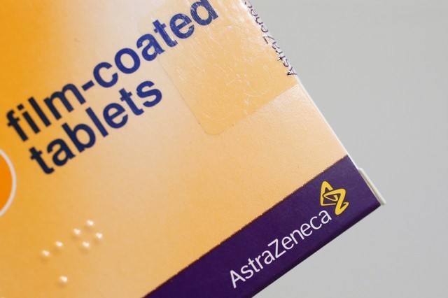 © Reuters. The logo of AstraZeneca is seen on a medication package in a pharmacy in London