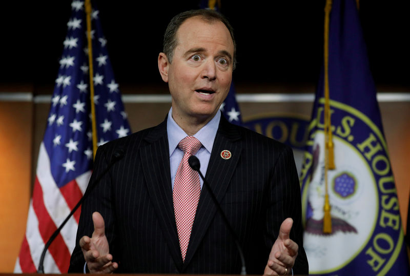 © Reuters. FILE PHOTO: House Intelligence Committee ranking Democrat Schiff reacts to statements by Committee Chairman Nunes about surveillance of President Trump and his staff during news conference at the U.S. Capitol in Washington