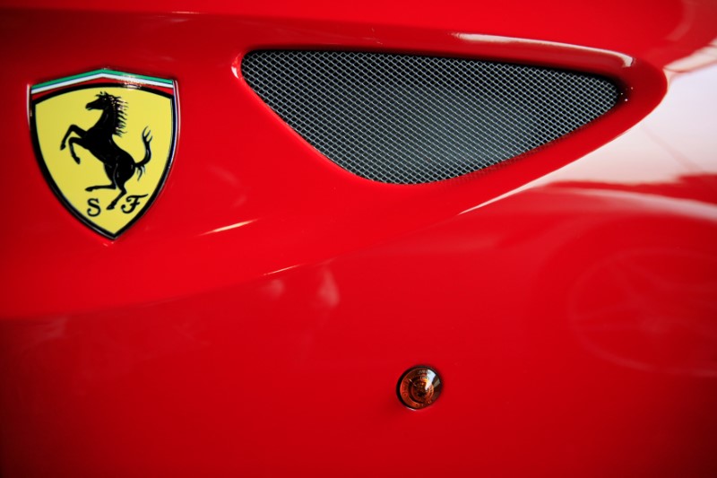 © Reuters. FILE PHOTO: The Ferrari logo on a car at a dealership in Singapore