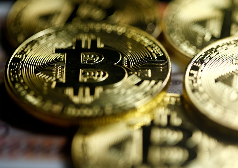 © Reuters. Bitcoins are seen in this illustration picture