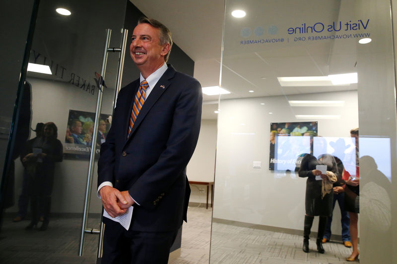 © Reuters. Republican candidate for Governor of Virginia Ed Gillespie waits to be introduced at a campaign event at the Northern Virginia Chamber of Commerce in Tysons