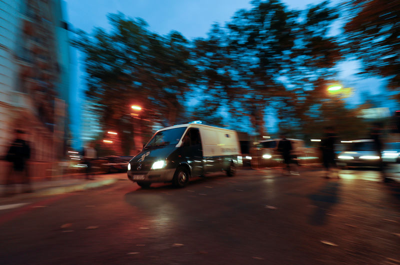 © Reuters. A van carrying members of the dismissed Catalan cabinet leaves a garage of Spain's High Court after they were remanded in custody in Madrid