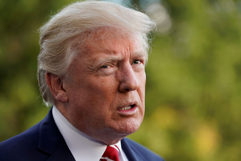 © Reuters. FILE PHOTO: President Donald Trump talks to the media