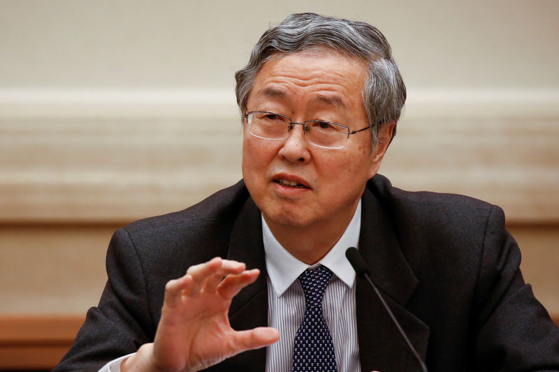 © Reuters. China's central bank governor Zhou Xiaochuan speaks during a session on the second day of the 19th National Congress of the Communist Party of China at the Great Hall of the People in Beijing