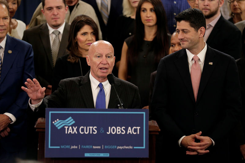 © Reuters. Chairman of the House Ways and Means Committee Kevin Brady (R-TX) and Speaker of the House Paul Ryan (R-WI) and unveil legislation to overhaul the tax code on Capitol Hill in Washington