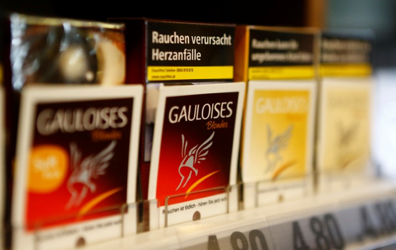 © Reuters. Packs of Gauloises cigarettes are on display in a tobacco shop in Vienna