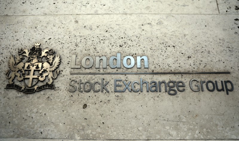 © Reuters. FILE PHOTO:A sign displays the crest and name of the London Stock Exchange in London