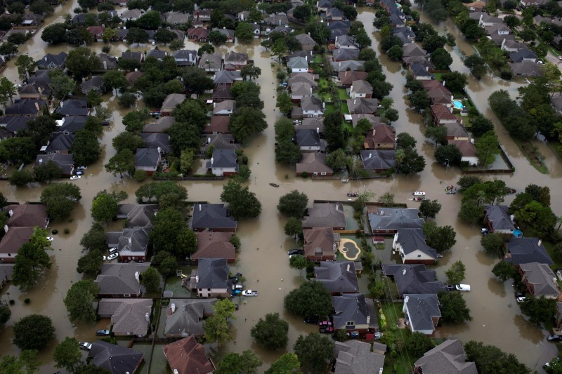 © Reuters. FILE PHOTO: Houses are seen submerged in flood waters caused by Tropical Storm Harvey in Houston