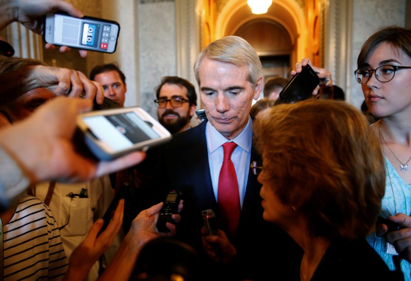 © Reuters. Senator Rob Portman (R-OH) speaks to reporters about the Senate healthcare bill on Capitol Hill in Washington