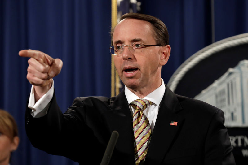 © Reuters. Deputy Attorney General Rosenstein addresses news conference at Justice Department in Washington