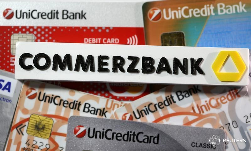© Reuters. A 3-D printed Commerzbank logo are seen near Unicredit credit cards in this illustration taken
