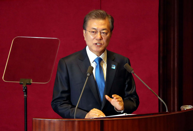 © Reuters. South Korean President Moon Jae-in delivers his speech on the 2018 budget bill during a plenary session at the National Assembly in Seoul