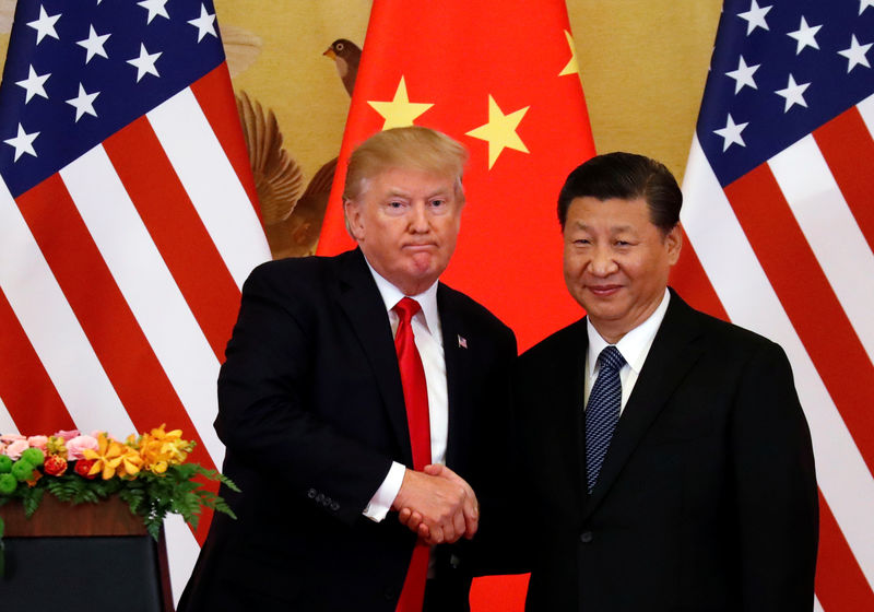 © Reuters. Presidente dos Estados Unidos, Donald Trump, e presidente da China, Xi Jinping, em Pequim