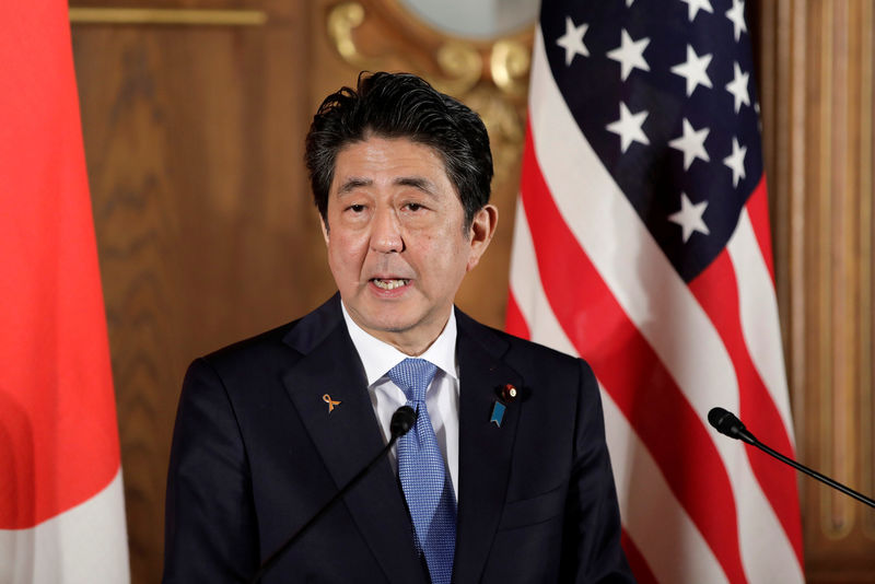 © Reuters. FILE PHOTO: Shinzo Abe, Japan's prime minister, speaks during a news conference with U.S. President Donald Trump, not pictured, at Akasaka Palace in Tokyo