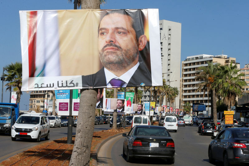 © Reuters. Posters depicting Lebanon's Prime Minister Saad al-Hariri are seen in Beirut