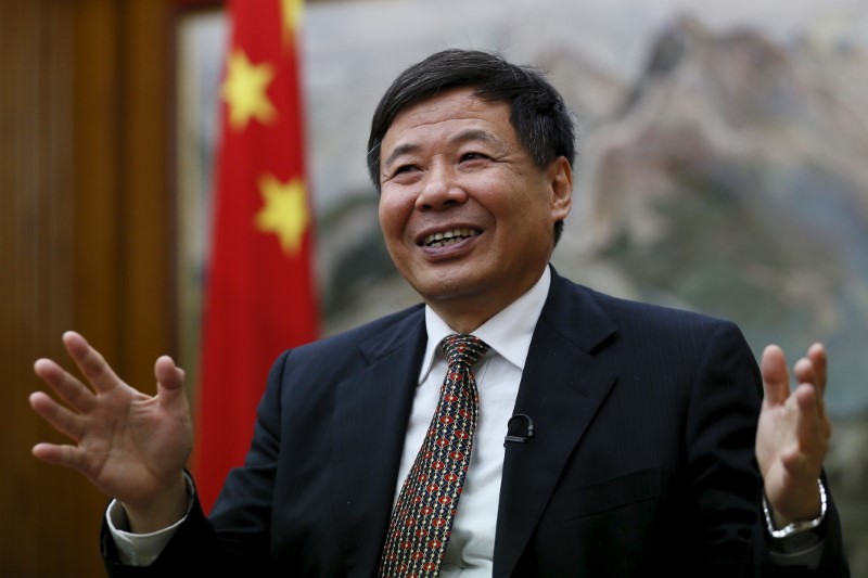 © Reuters. China's Vice Finance Minister Zhu Guangyao gestures during an interview with Reuters at the Chinese embassy in London
