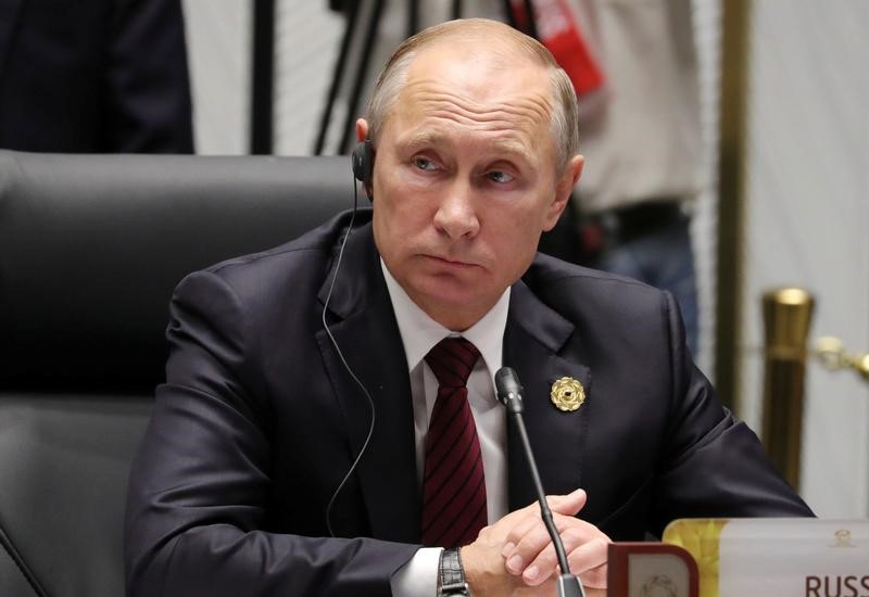© Reuters. بوتين: القيود على وسائل إعلام روسية في أمريكا هجوم على حرية التعبير