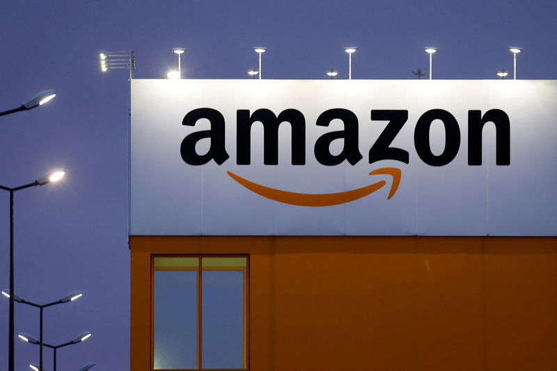 © Reuters. FILE PHOTO: The logo of Amazon is seen at the company logistics center in Lauwin-Planque, northern France