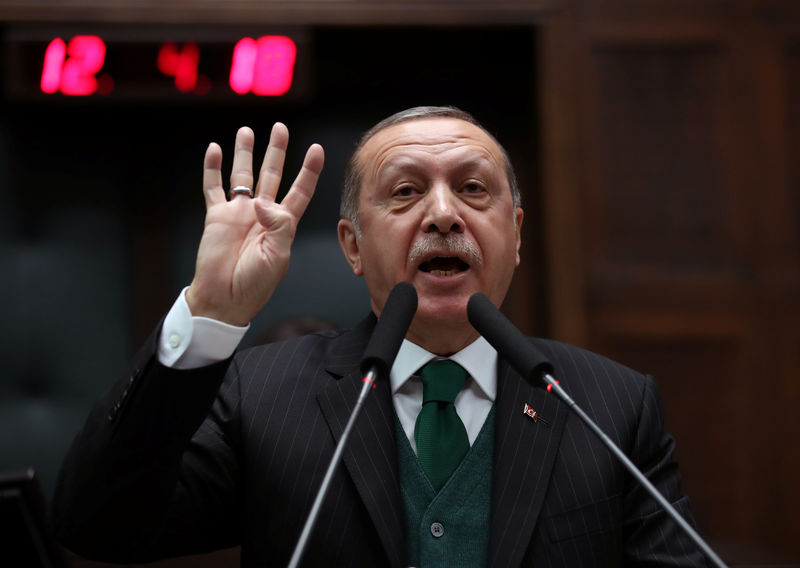 © Reuters. Turkish President Erdogan addresses members of parliament from his ruling AKP during a meeting at the Parliament in Ankara