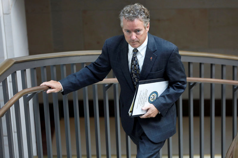 © Reuters. FILE PHOTO: Senator Rand Paul (R-KY) departs after a briefing on Capitol Hill in Washington