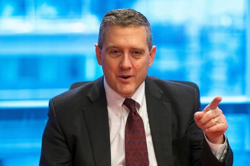 © Reuters. FILE PHOTO: St. Louis Fed President James Bullard speaks about the U.S. economy during an interview in New York