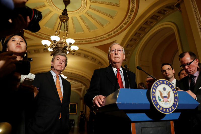 © Reuters. Senate Majority Leader Mitch McConnell, accompanied by Sen. Roy Blunt (R-MO), speaks with reporters following the party luncheons on Capitol Hill in Washington