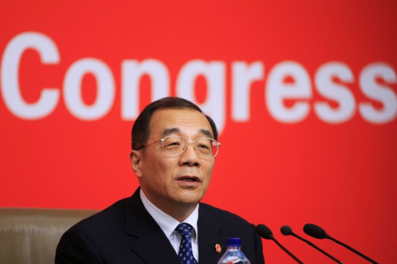 © Reuters. China's Minister of Supervision, and Chief of the National Bureau of Corruption Prevention, Yang Xiaodu attends a news conference during the 19th National Congress of the Communist Party of China in Beijing