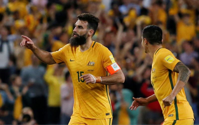 © Reuters. ثلاثية يديناك ترسل استراليا إلى كأس العالم