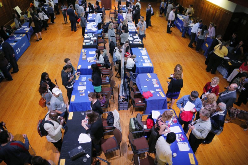 © Reuters. Job seekers with visual impairments and potential employers talk at the fourth Annual Job Fair for Individuals with Visual Impairments in Cambridge, Massachusetts